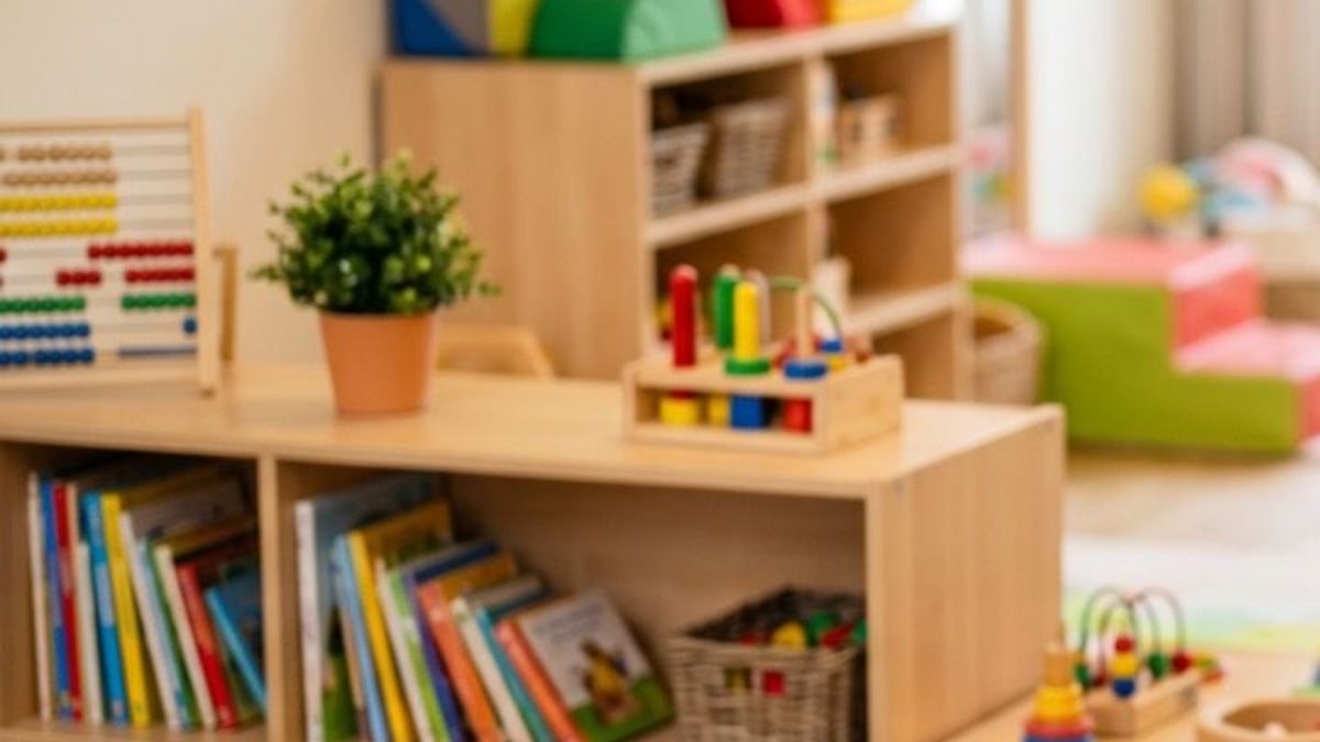 Childcare playroom during cleaning — colour-coded cloths, mats drying, toys organised