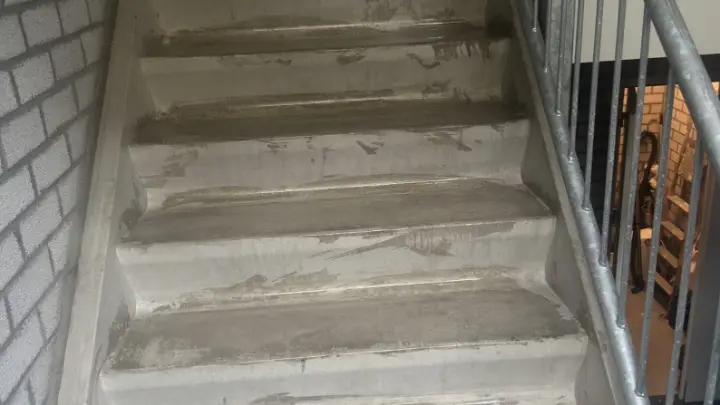 Dusty concrete stairs after building work