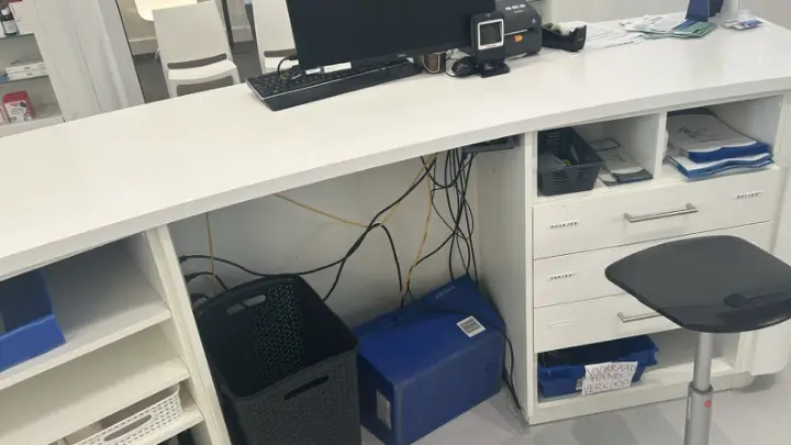 A work counter behind a shop desk